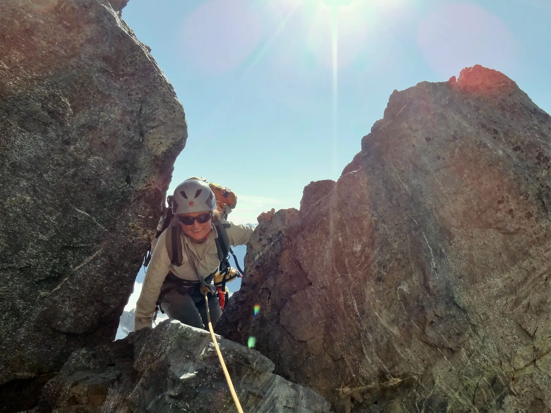 Moving together on the rope through the rocky section on Mount Tutoko.