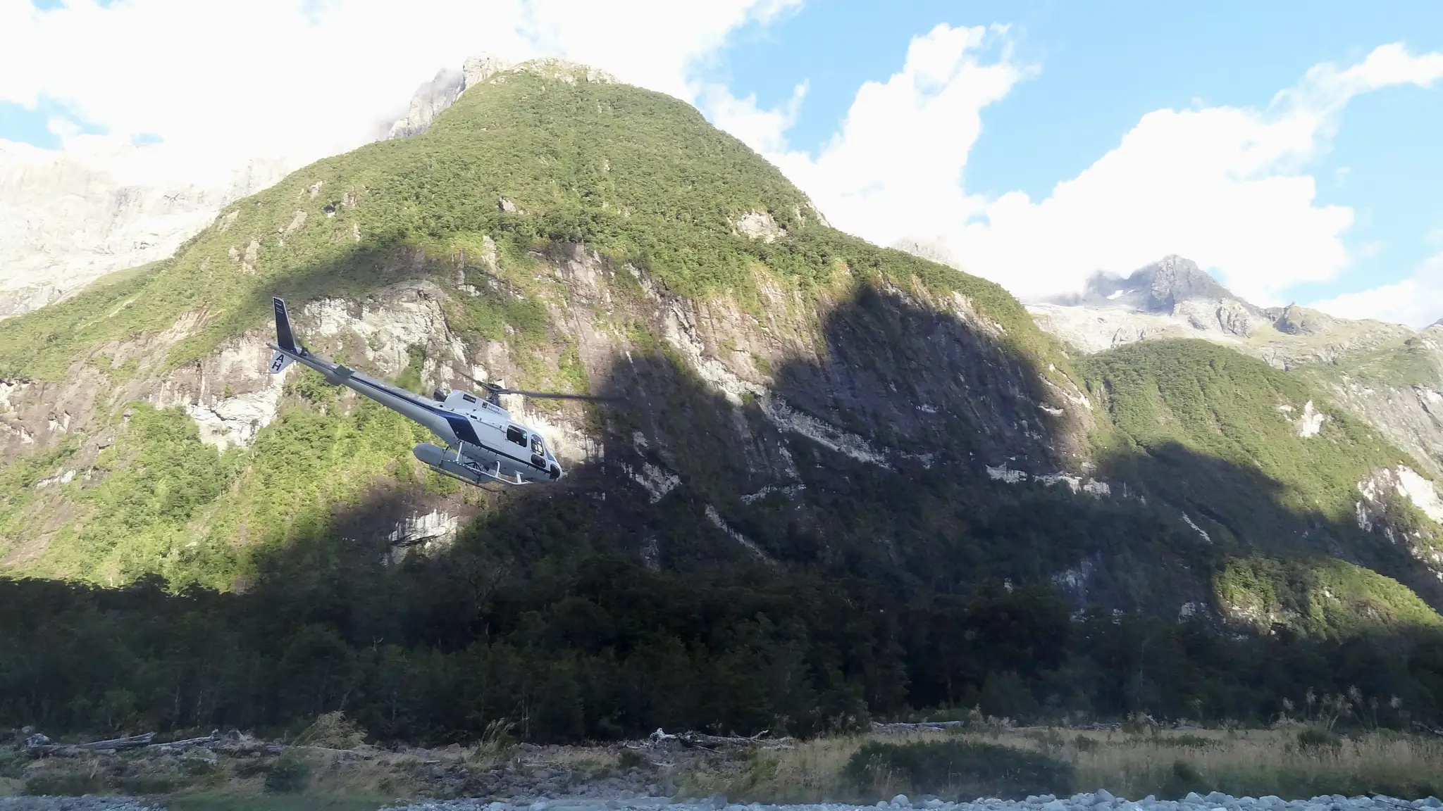 Search and rescue helicopter approaching us in the Tutoko Valley.