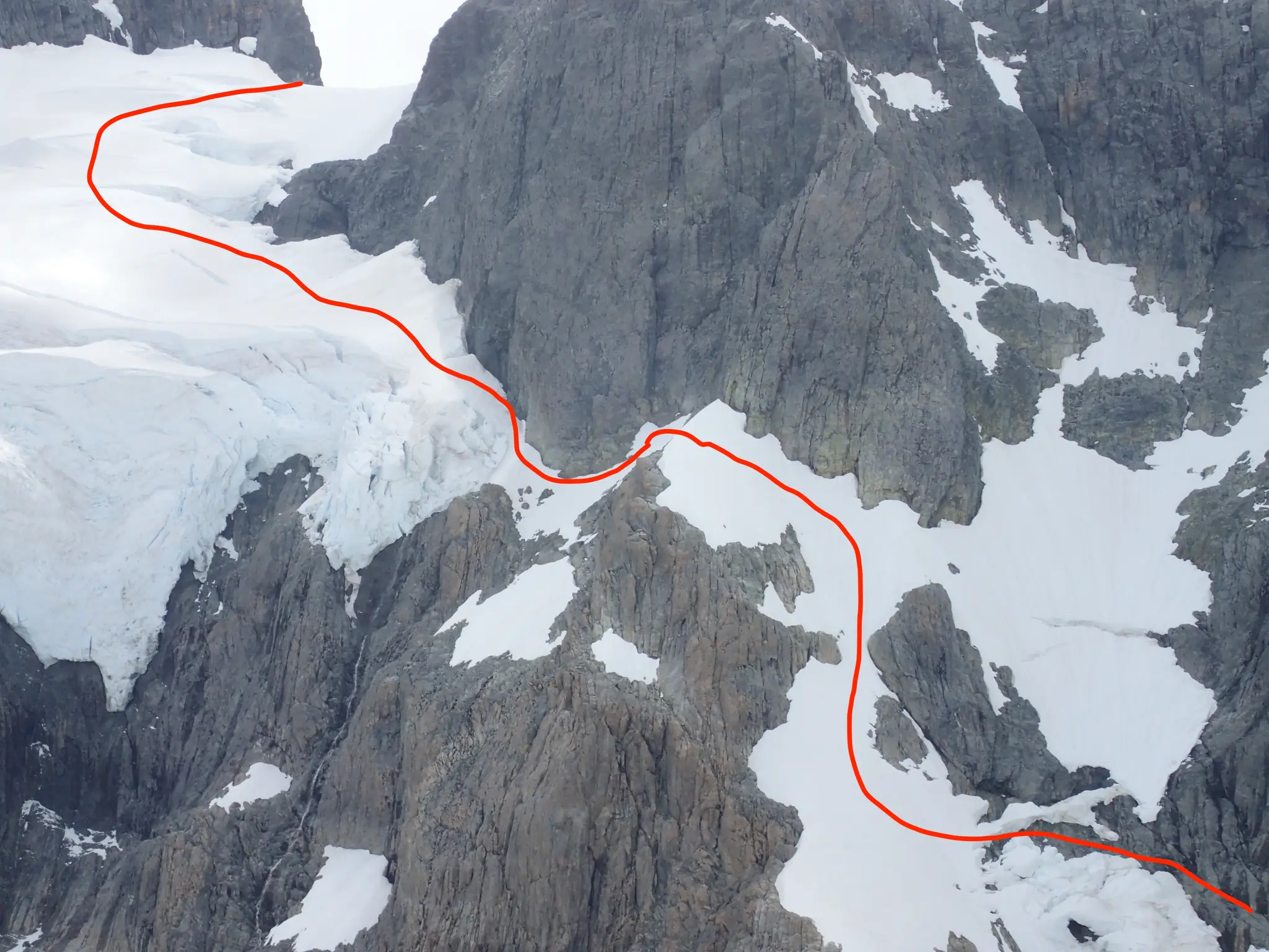 Upper section of our route across Mount Tutoko's South-East Face towards the South-East Ridge, marked in red.