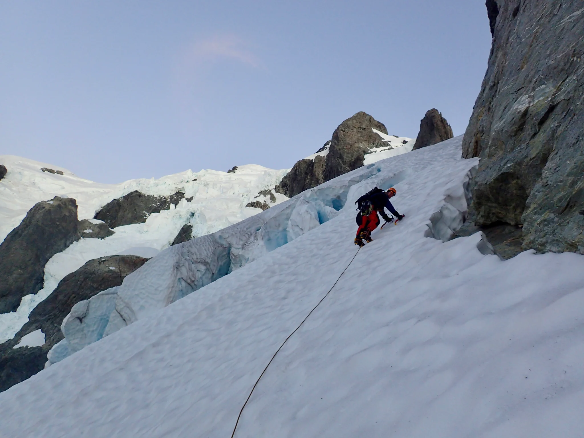 Willie climbing the lower snow slope on Mount Tutoko.