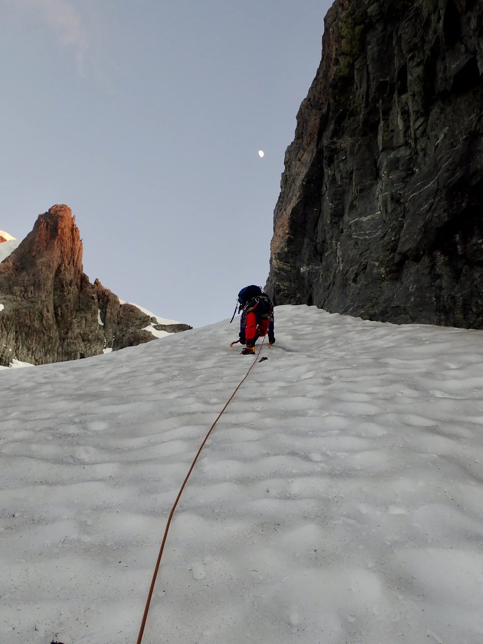 Willie climbing the lower snow slope on Mount Tutoko.