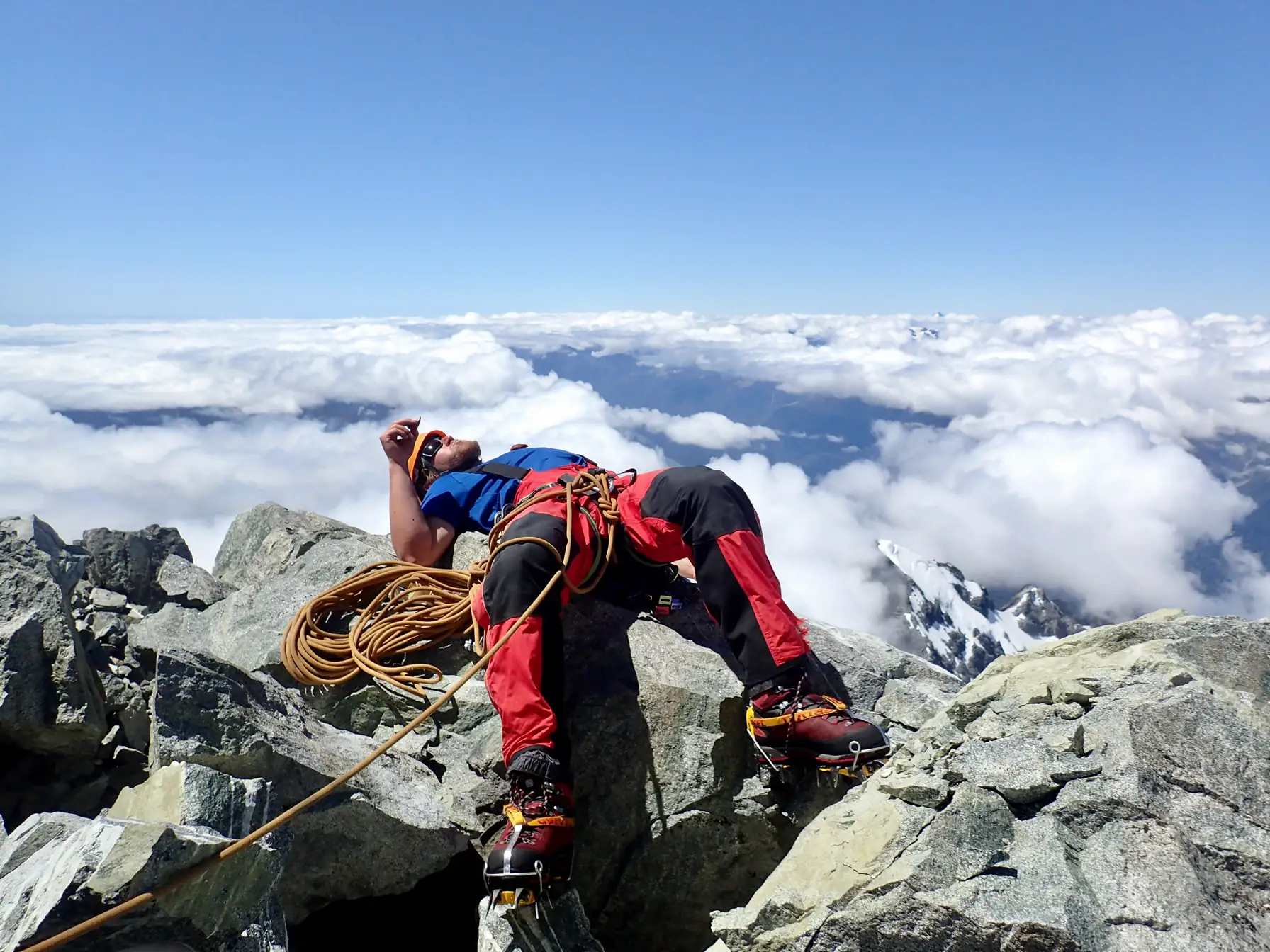 Tired Willie on the summit of Mount Tutoko.