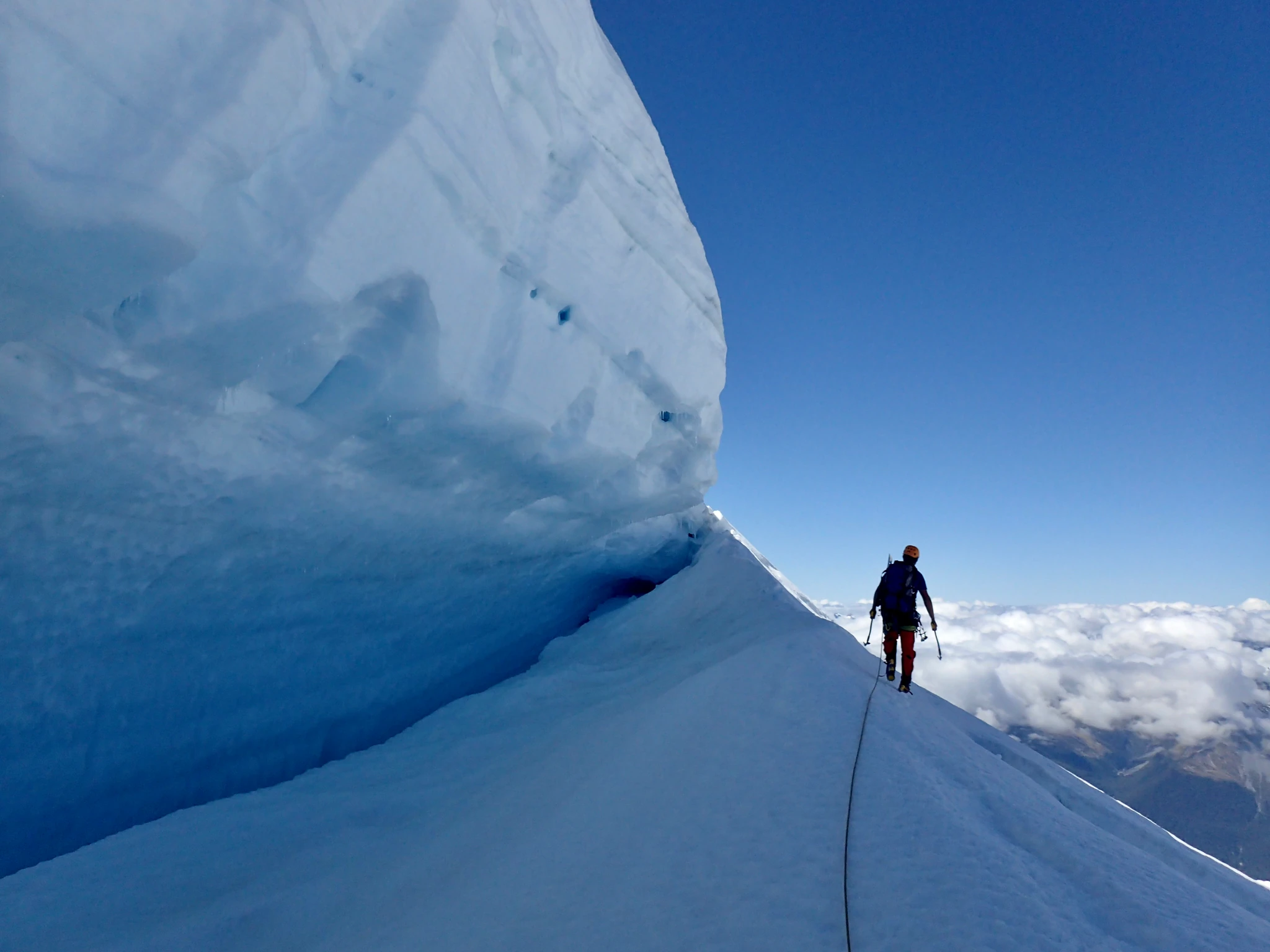 Passing between crevasses in the upper part of Mount Tutoko.